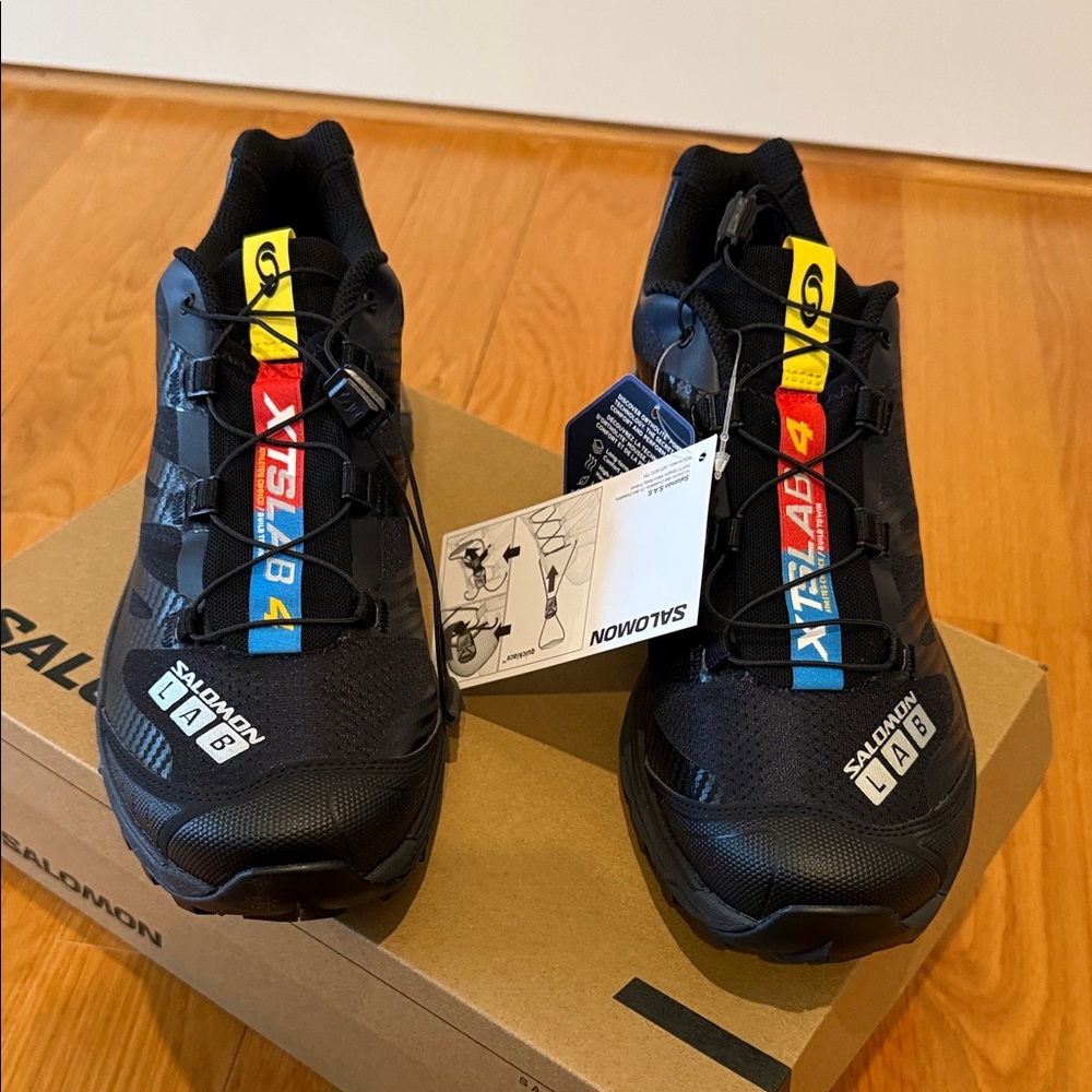 Salomon Black Trail Shoes with Red, Blue & Yellow Tongue Tabs